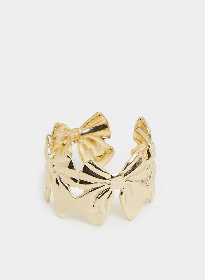 ستايلي خاتم بارز بتصميم فيونكة ذهبية - Image 2